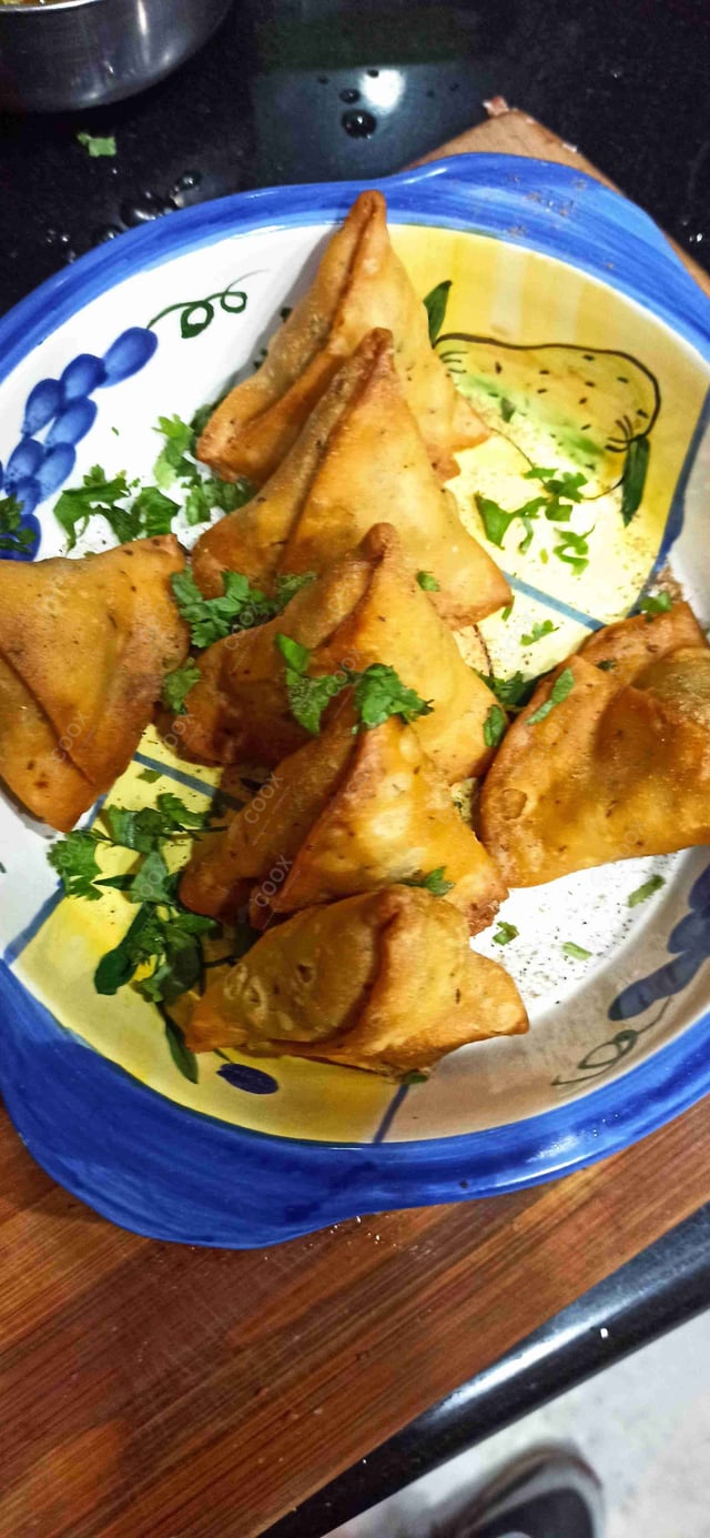 Delicious Mini Samosas prepared by COOX