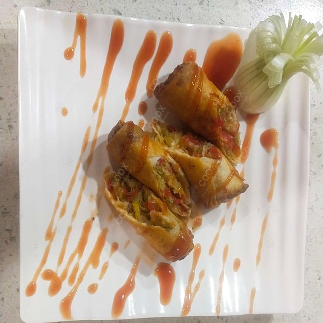 Delicious Veg Spring Rolls prepared by COOX