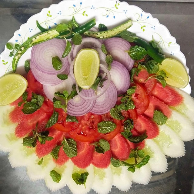 Delicious Salad, Raita, Papad prepared by COOX