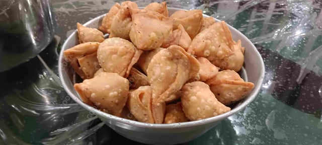 Delicious Mini Samosas prepared by COOX