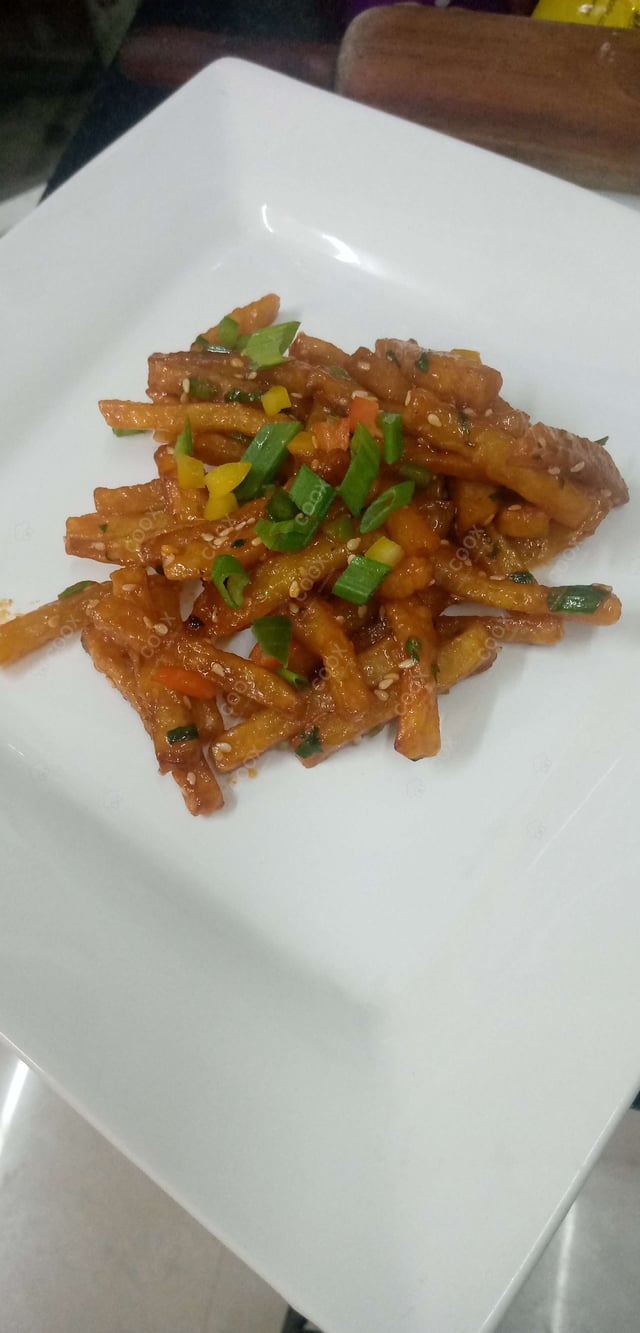 Delicious Honey Chilly Potato prepared by COOX