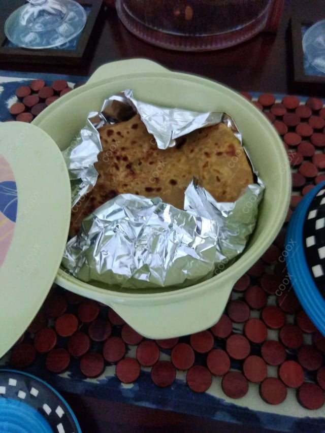 Delicious Stuffed Paranthas prepared by COOX