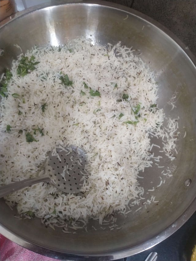 Delicious Jeera Rice prepared by COOX