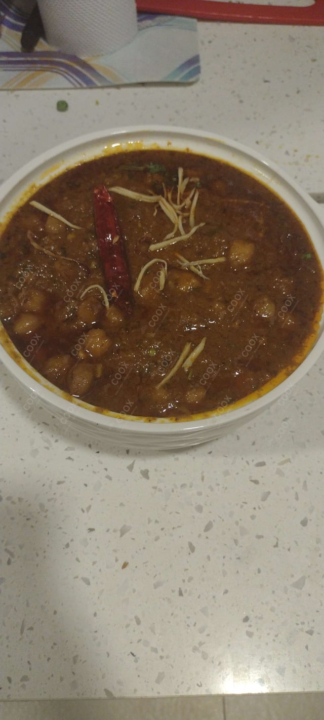 Delicious Chole Masala prepared by COOX