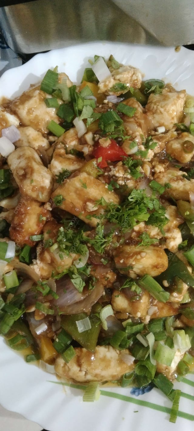 Delicious Chilly Paneer (Dry) prepared by COOX