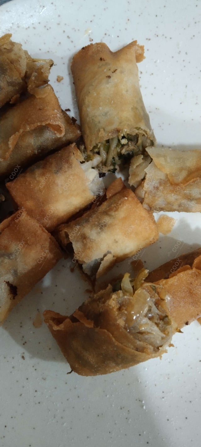 Delicious Veg Spring Rolls prepared by COOX