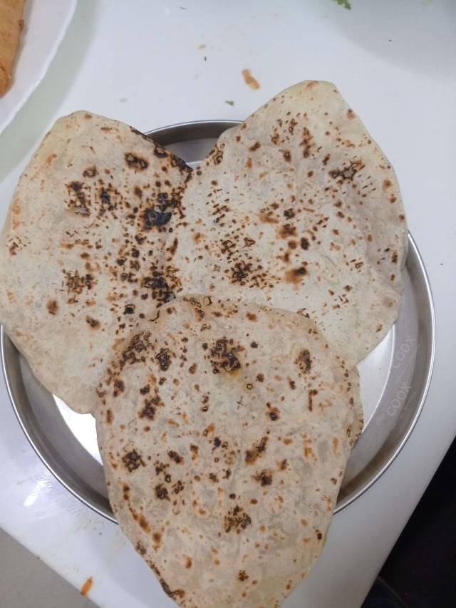 Delicious Naan (Butter / Garlic) prepared by COOX