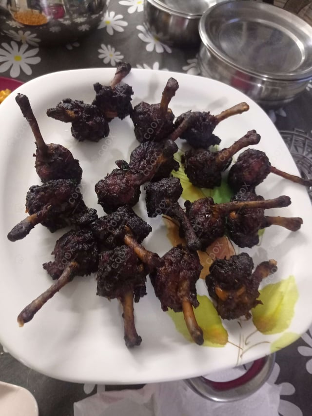 Delicious Chicken Lollipop prepared by COOX