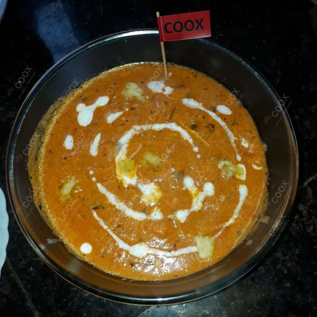 Delicious Butter Chicken prepared by COOX