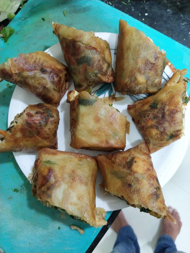 Delicious Chicken Spring Rolls prepared by COOX