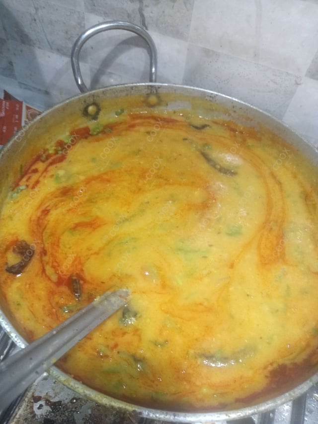 Delicious Dal Tadka prepared by COOX