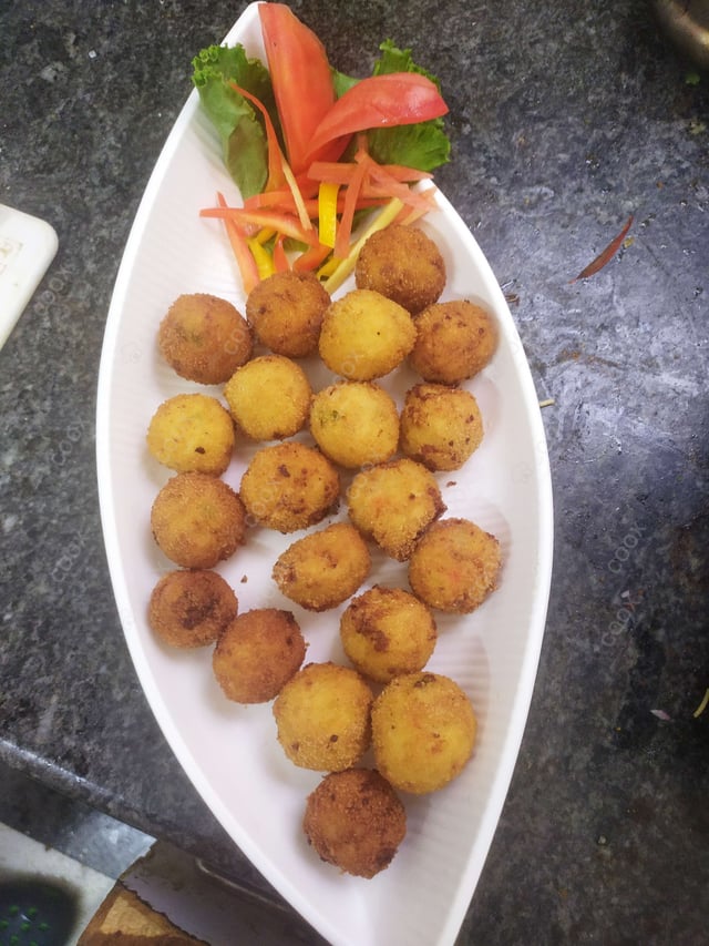 Delicious Fried Cheese Balls prepared by COOX