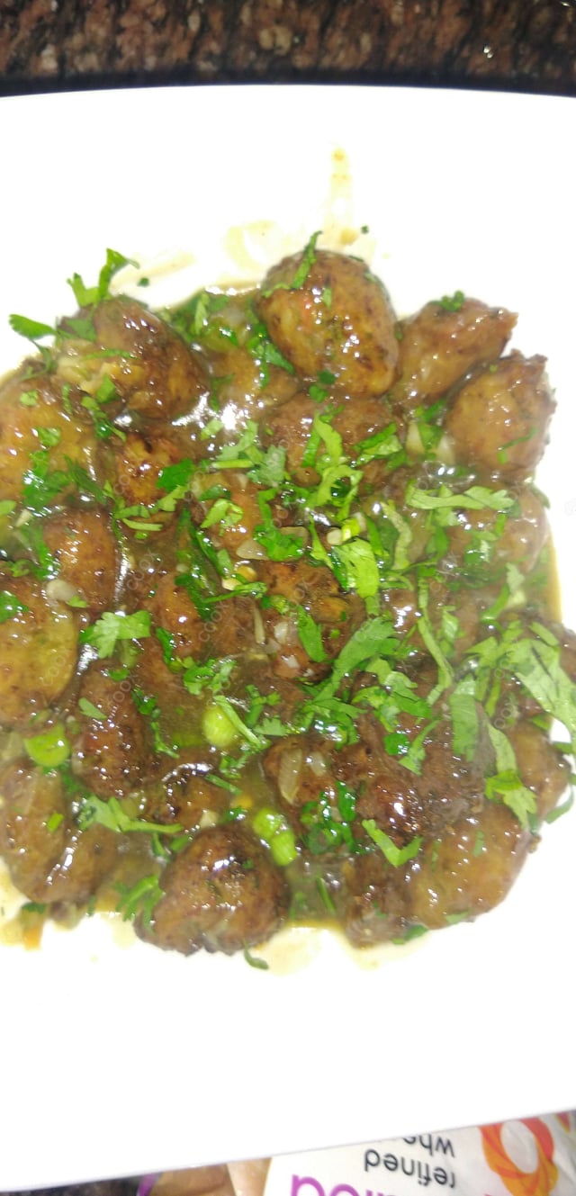 Delicious Veg Manchurian (Dry) prepared by COOX