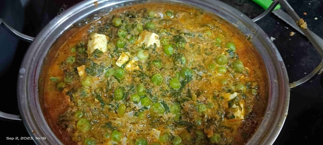 Delicious Methi Matar Malai prepared by COOX