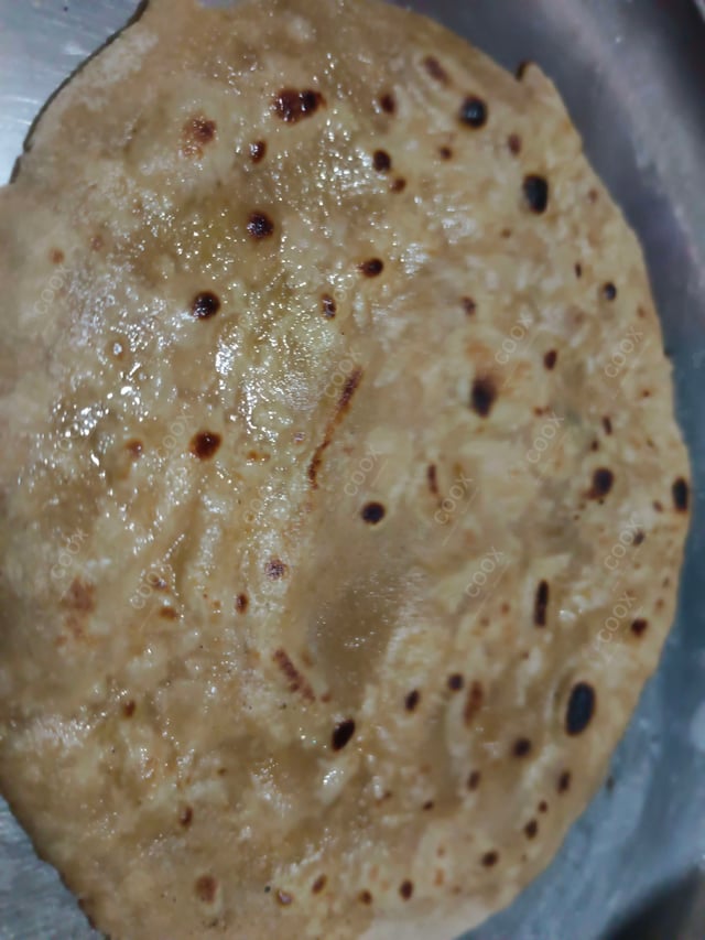 Delicious Lachha Parathas prepared by COOX