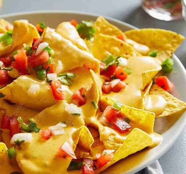 Delicious Cheese Nachos prepared by COOX