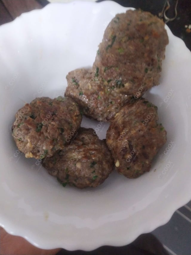 Delicious Mutton Seekh Kebab prepared by COOX