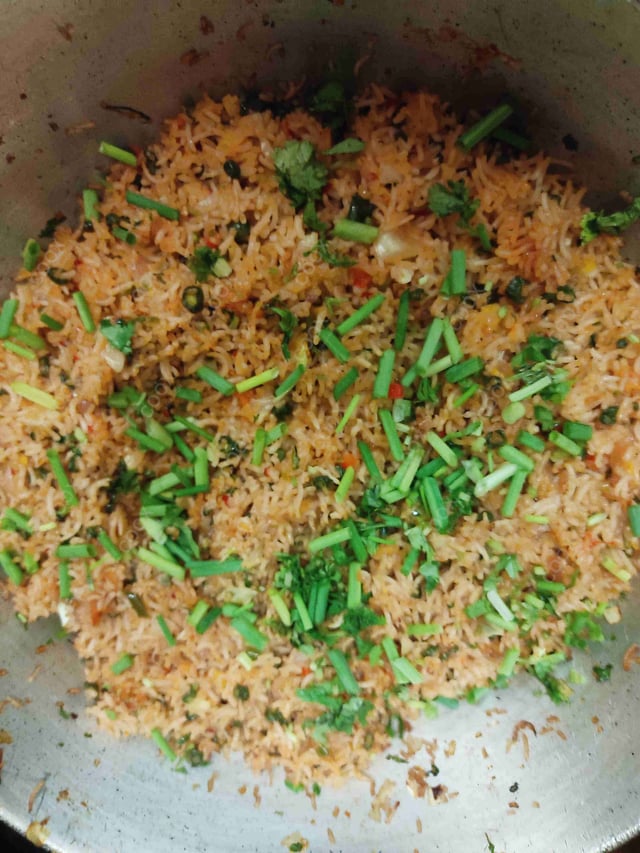 Delicious Schezwan Fried Rice prepared by COOX