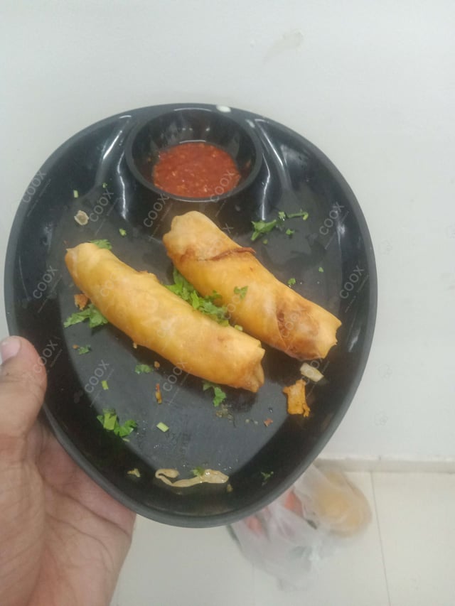 Delicious Veg Spring Rolls prepared by COOX