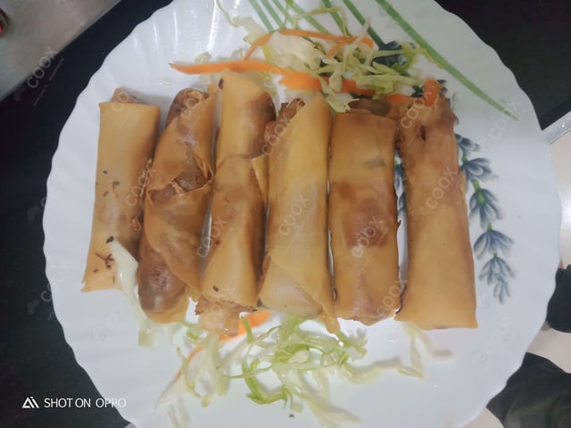 Delicious Veg Spring Rolls prepared by COOX