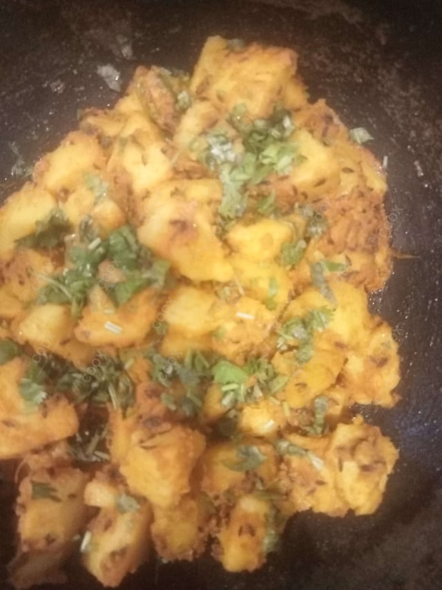 Delicious Jeera Aloo prepared by COOX