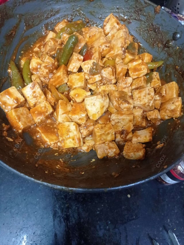 Delicious Chilli Paneer (Dry) prepared by COOX