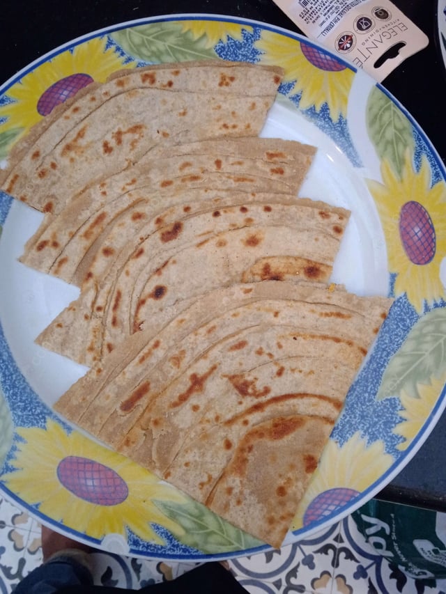 Delicious Tawa Rotis prepared by COOX