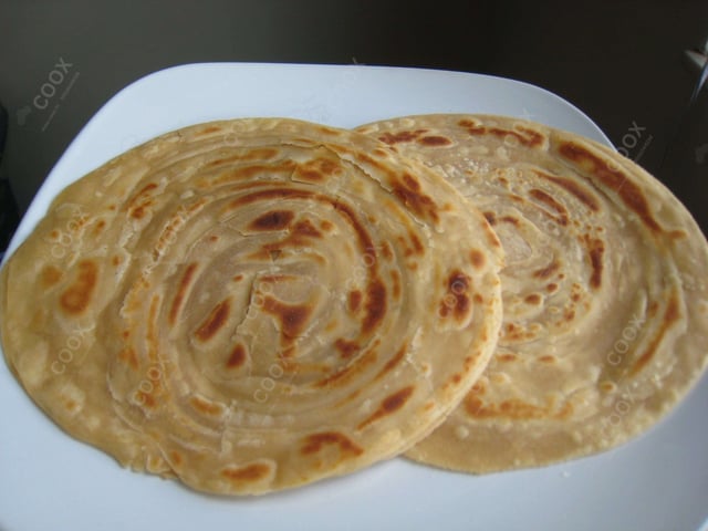 Delicious Lachha Paranthas & Rotis prepared by COOX