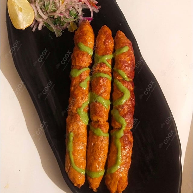 Delicious Mutton Seekh Kebab prepared by COOX