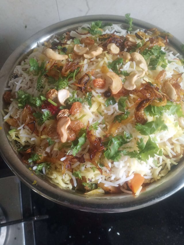 Delicious Veg Biryani prepared by COOX