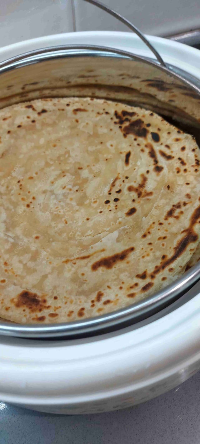 Delicious Lachha Parathas prepared by COOX