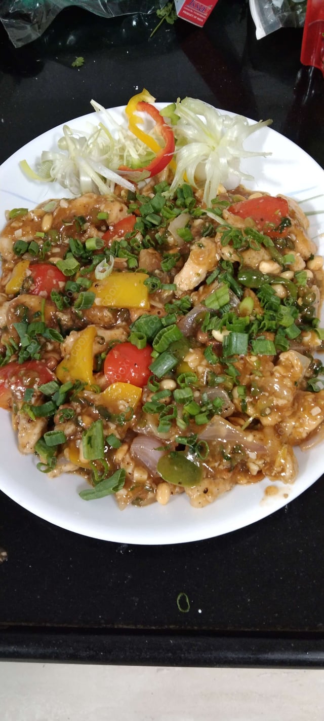 Delicious Kung Pao Chicken prepared by COOX