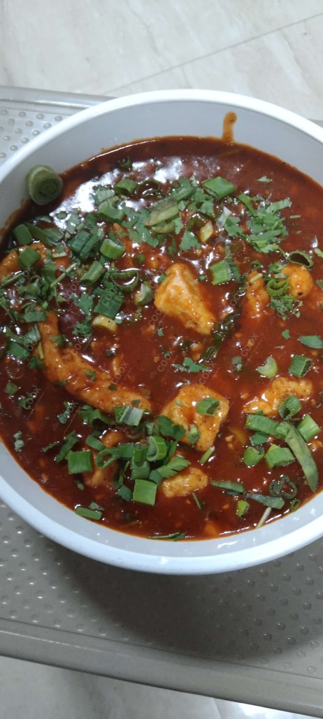 Delicious Chicken in Schezwan Sauce prepared by COOX