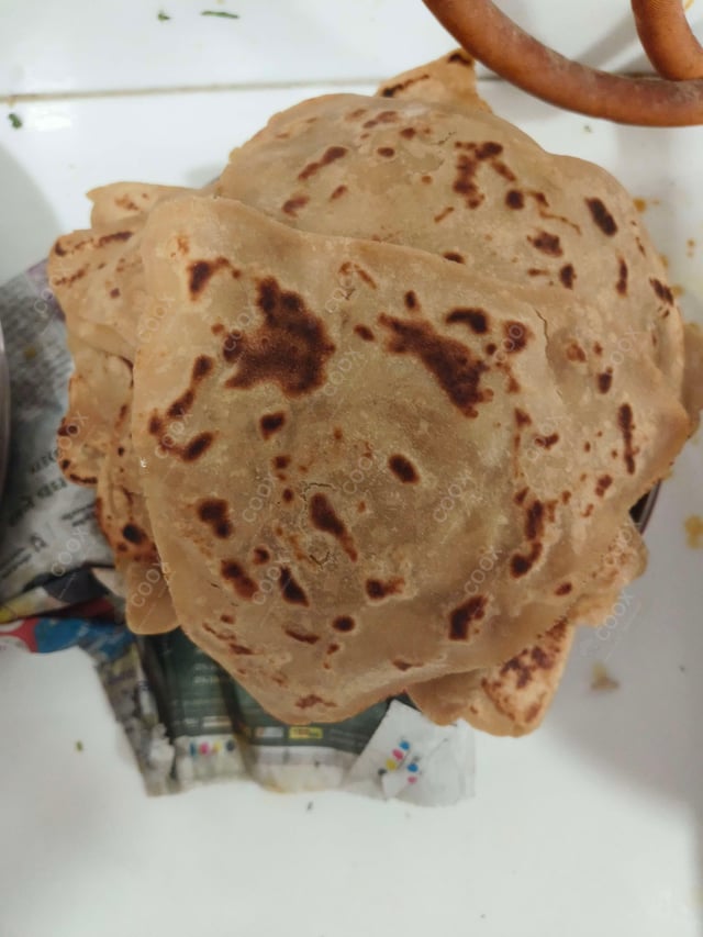 Delicious Lachha Parathas prepared by COOX