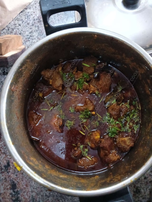 Delicious Mutton Rogan Josh prepared by COOX