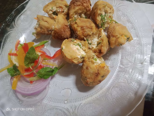 Delicious Dahi ke Sholey prepared by COOX