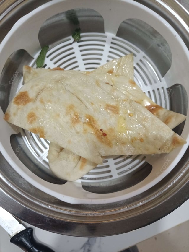 Delicious Naan (Butter / Garlic) prepared by COOX