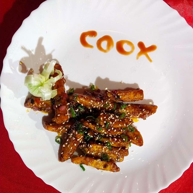 Delicious Honey Chilly Potato prepared by COOX