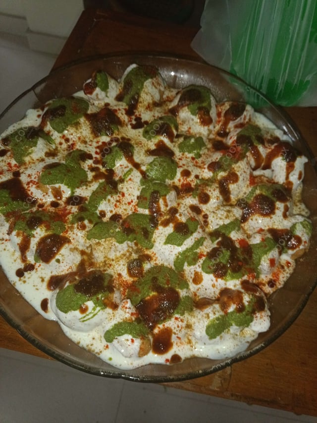 Delicious Dahi Bhalla prepared by COOX