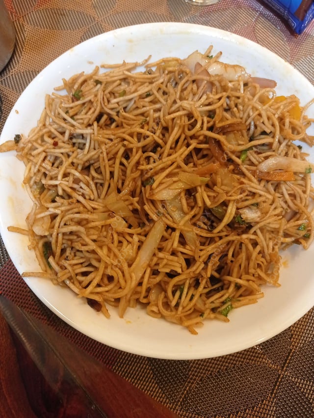 Delicious Veg Hakka Noodles prepared by COOX