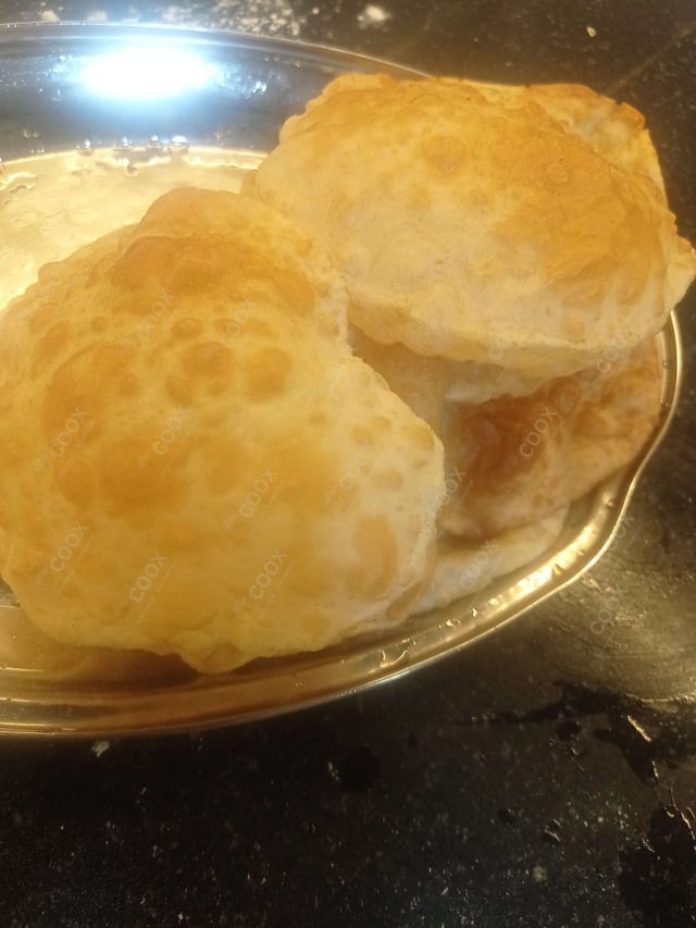 Delicious Bhature prepared by COOX