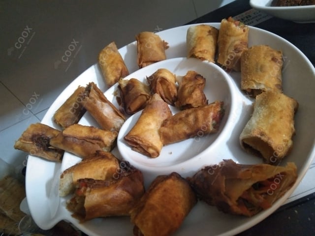 Delicious Veg Spring Rolls prepared by COOX