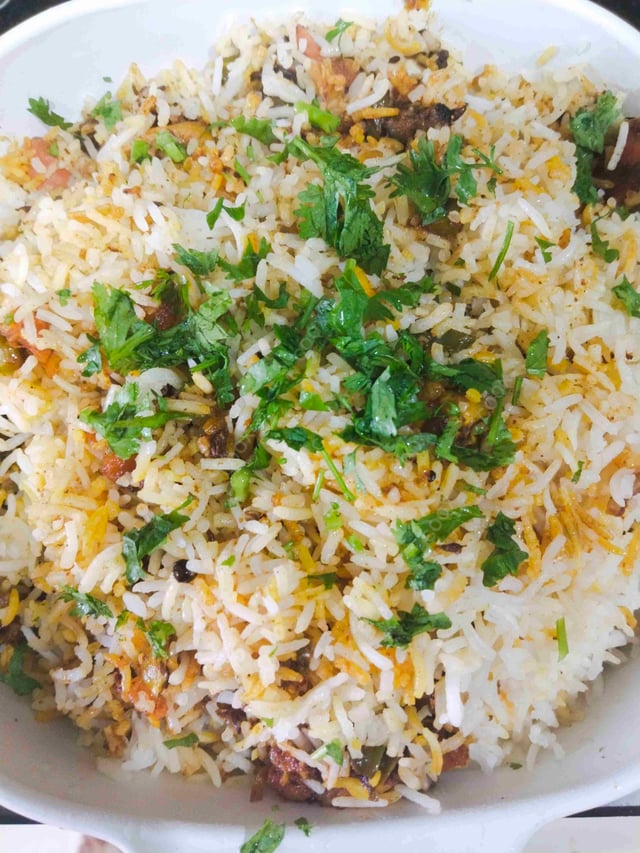 Delicious Veg Biryani prepared by COOX