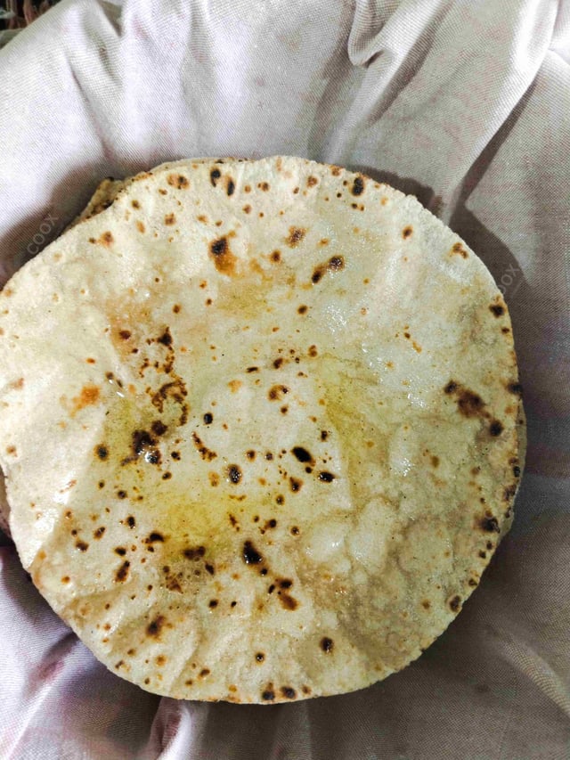 Delicious Tawa Rotis prepared by COOX