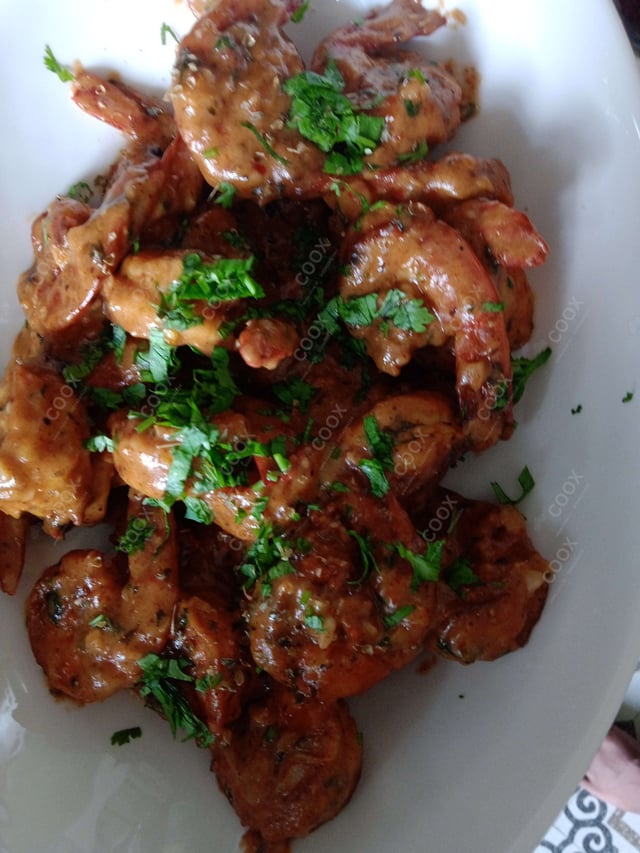 Delicious Butter Garlic Prawns prepared by COOX