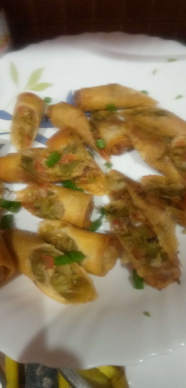 Delicious Veg Spring Rolls prepared by COOX