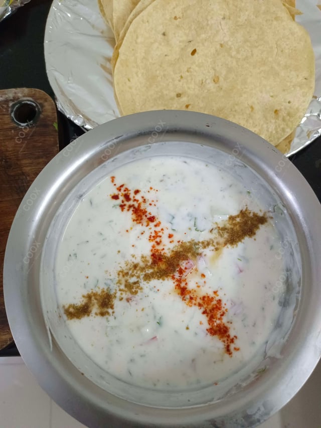 Delicious Mix Veg Raita prepared by COOX