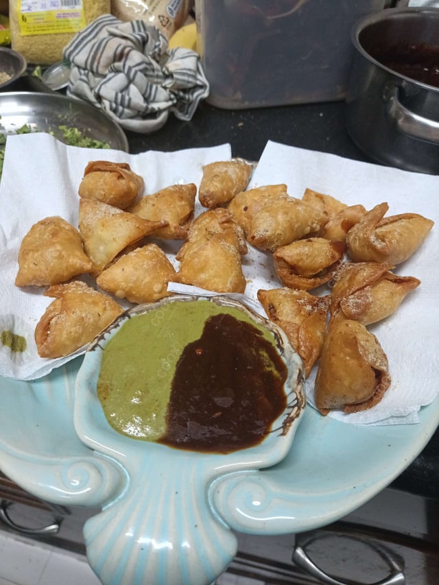 Delicious Mini Samosas prepared by COOX