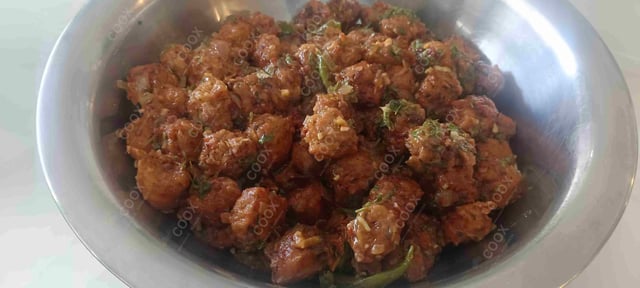 Delicious Veg Manchurian (Dry) prepared by COOX