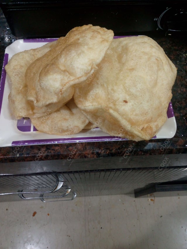 Delicious Bhature prepared by COOX